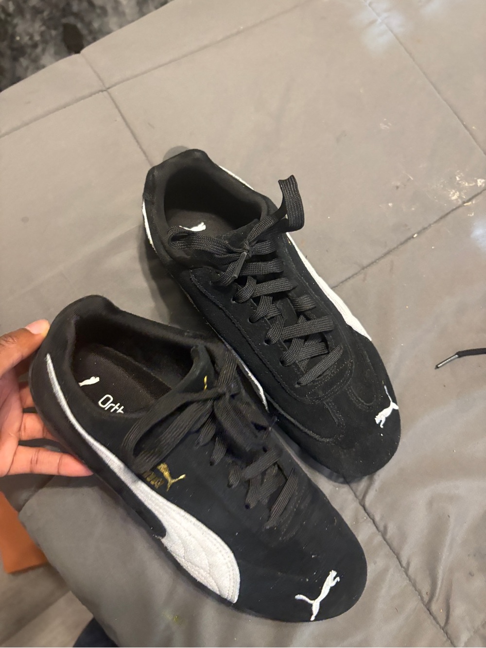 Puma women’s Black Suede Lace-Up Sneakers with White Formstrip